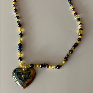 Unbranded art glass heart shape pendant necklace. Glass and hematite beads.